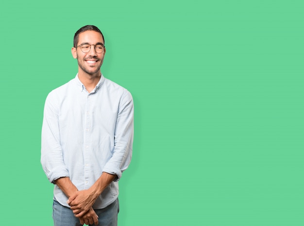 Happy young man looking up gesture