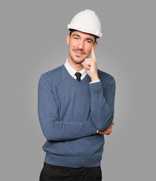 Happy young man with a gesture of satisfaction