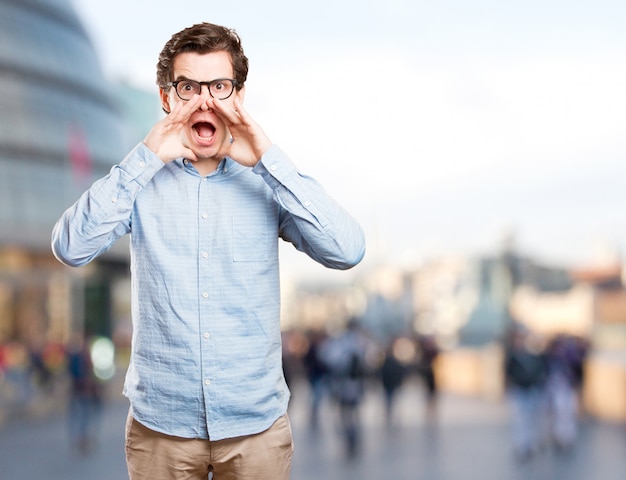 Happy young man with a relaxation gesture man shouting