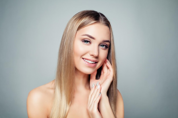 Happy young model woman face Smiling girl portrait