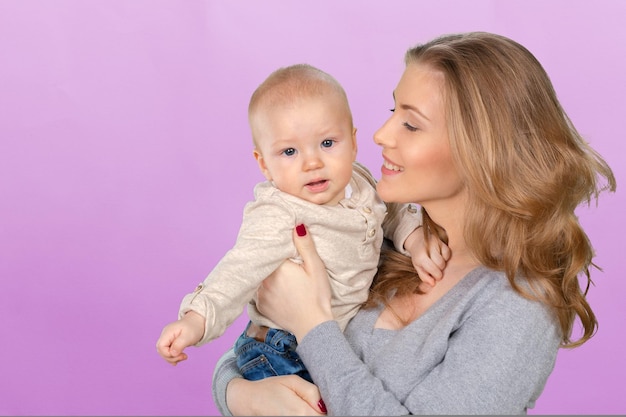 Happy young mother and her son