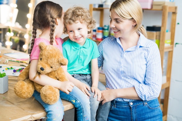 Happy Young Mother with Two Kids