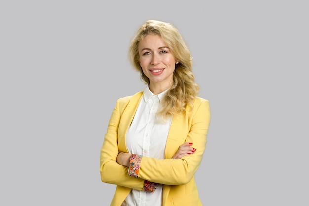 happy young office manager crossed arms