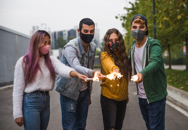 Happy young people meeting outdoors