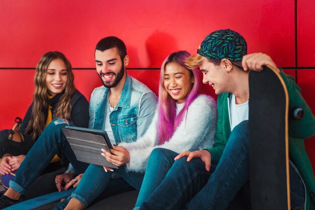 Happy young people meeting outdoors