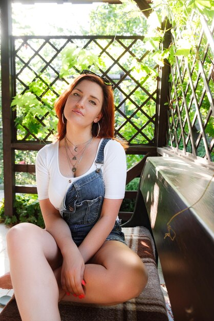 Happy young redhair woman portrait summer outdoors