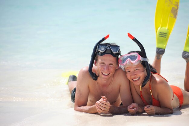 happy young romantic couple in love have fun running and relaxing on beautiful beach