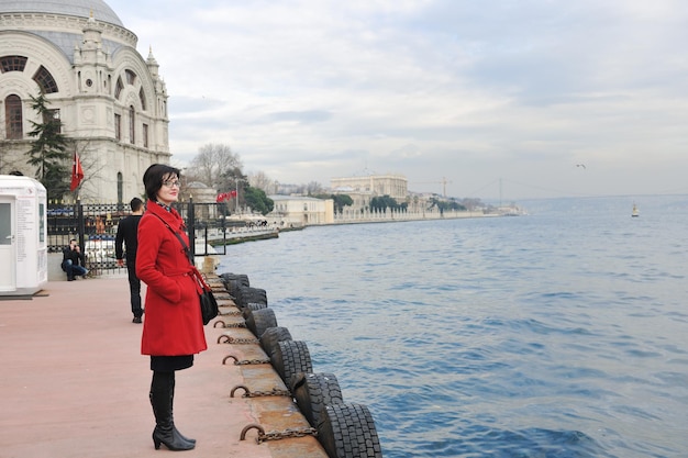 happy young tourist woman travel visit ancient istambul in turkey and old ayasofya blue mosque