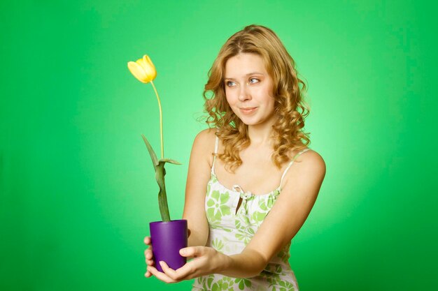 Happy Young Woman Hugging Flower