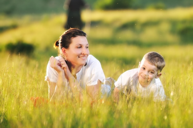 happy young woman mother play and outdoor with beautiful child