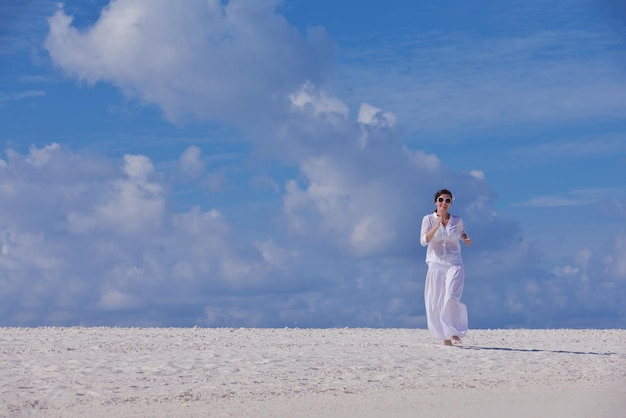 happy young woman on summer vacation on beautiful tropical beach have fun and relax