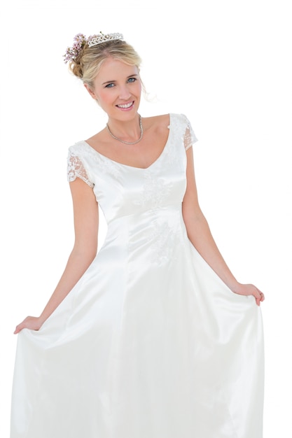 Happy young woman wearing wedding dress