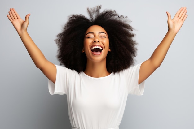 Happy young woman in a white empty Tshirt for advertising on a solid color background in studio