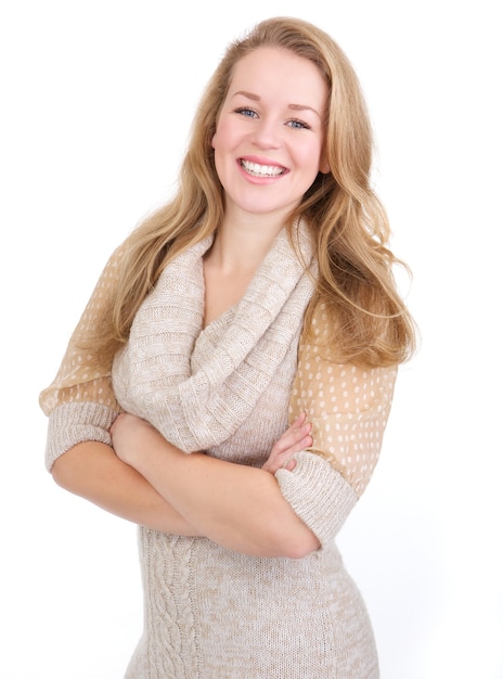 Happy young woman with arms crossed