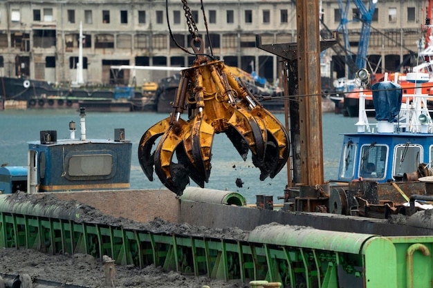 Harbor port dredge working on sea