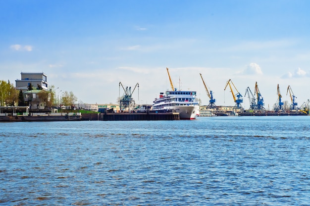 Harbor with ship and cranes