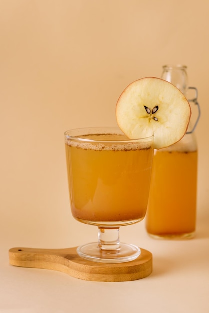 Hard Apple Cider Cocktail in Glass Decorated With Apple Slocee Autumn or Winter Drink