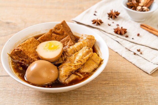 hard-boiled egg in brown sauce or sweet gravy