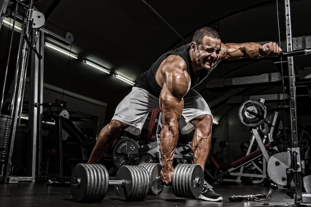 Hard Core Bodybuilding Bodybuilder ready to lift heavy dumbbell