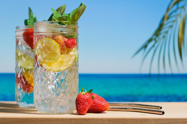 Hard seltzer cocktails on summer beach