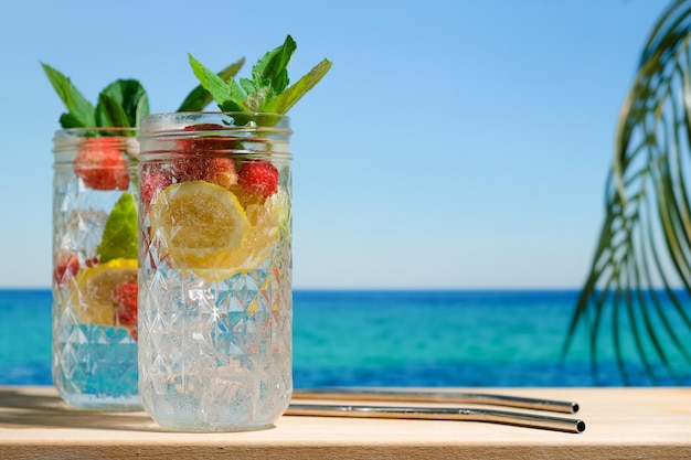 Hard seltzer cocktails on tropical beach