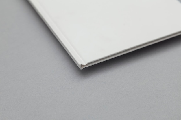 Hardback book cover mockup White book on a grey background