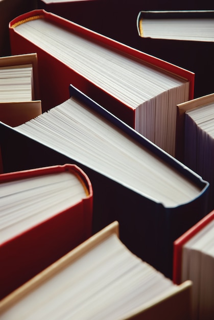 Photo hardcover books standing as background