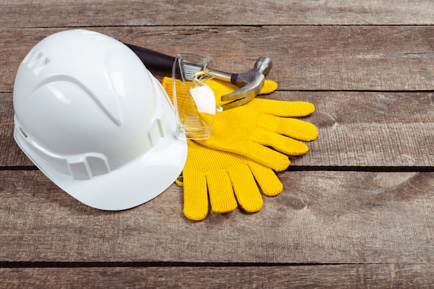 Hardhat and old leather gloves