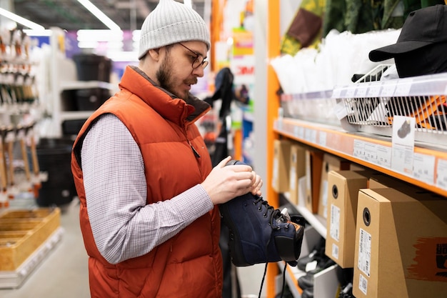 Hardware store customer chooses reliable safety boots