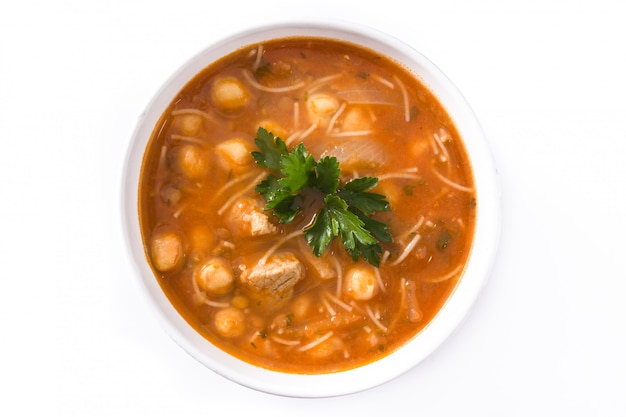 Harira soup in bowl isolated on white typical moroccan food.