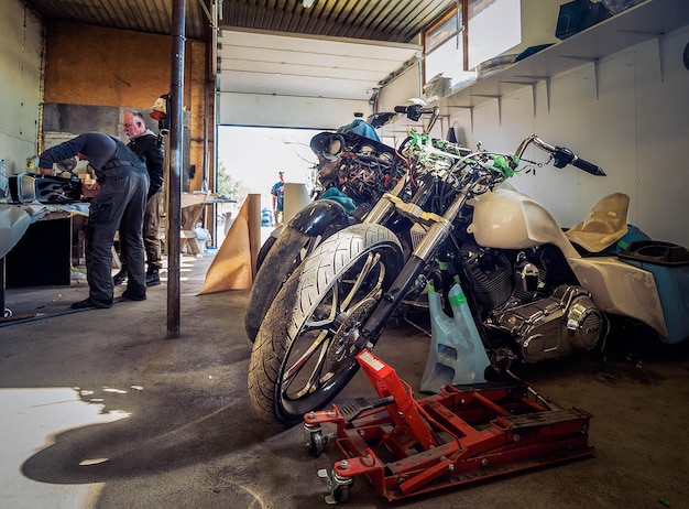 Harley Davidson motorcycles in a motorcycle workshop on the outskirts