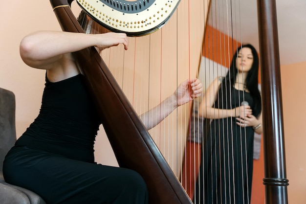 Photo harp and voice duo rehearsing their next concert