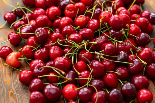 The harvest of berries. Berry cherry background.