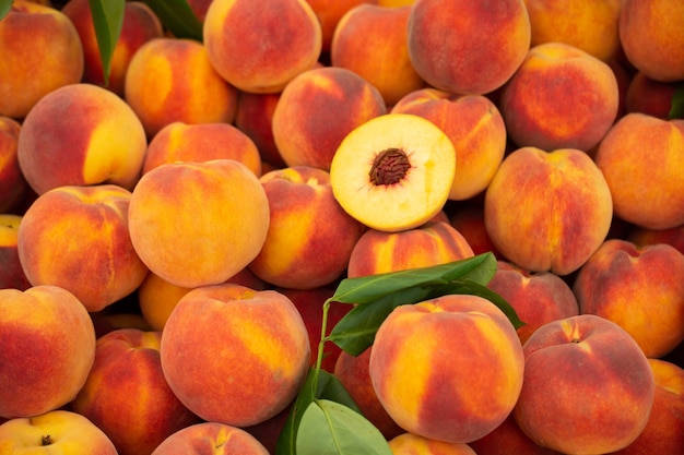 Harvest of fresh tasty peaches fruit at farmers agricultural\
products sale in market