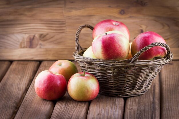 Harvest ripe apples in a basket