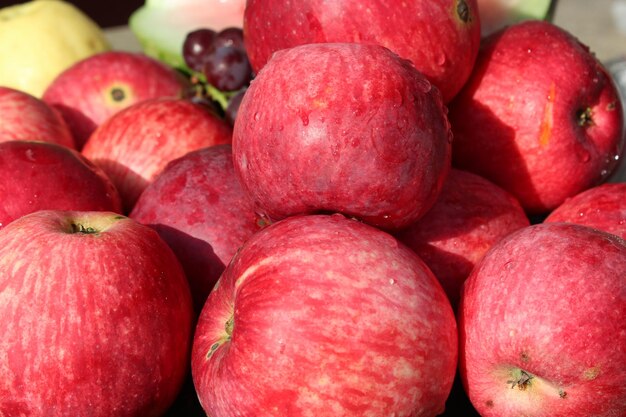 harvest of tasty and ripe red apples