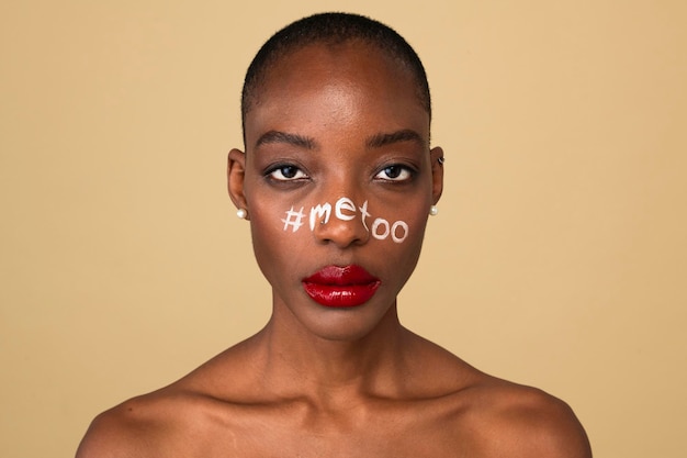 Hashtag metoo on an African American woman&amp;#39;s face