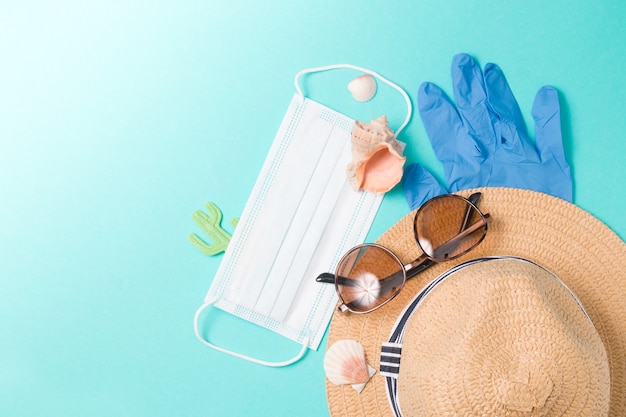 Photo hat, sun glasses, rubbe gloves, shells and face mask