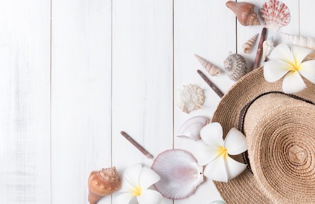 Hat on vintage white wooden background