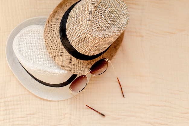 Hats on beige muslin fabric