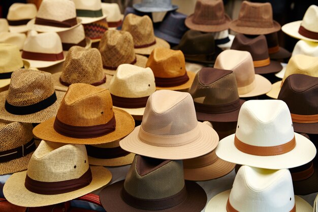 Hats in outdoor store stacked in rows