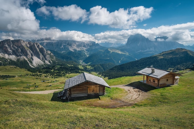 Hats for resting during the hike on Seceda plateau in Dolomites Alps Odle mountain range South