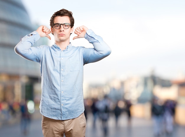 Haughty young man posing