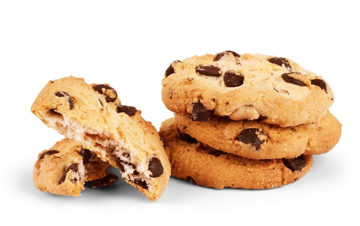 Foto havermoutkoekjes met chocolade op witte achtergrond