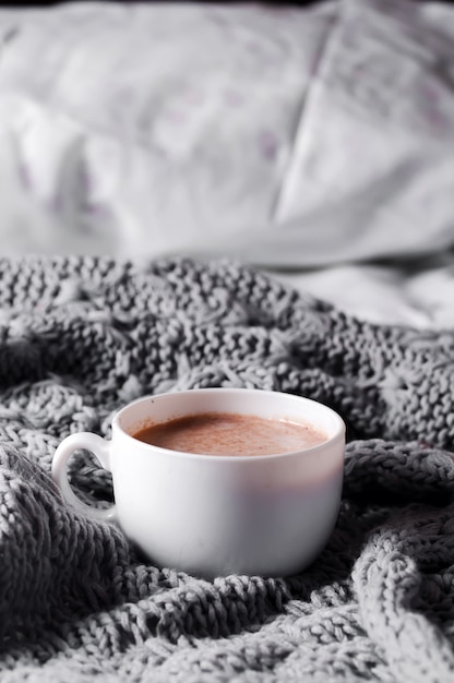 Having a cup of coffee in bed