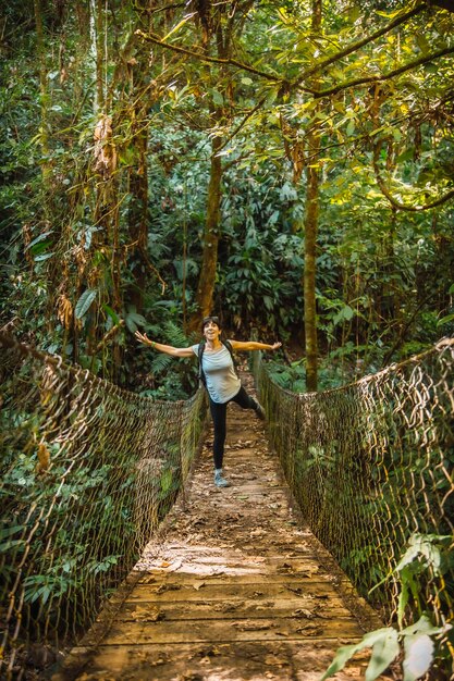 Having fun at the bridge of the Cerro Azul Meambar National Park Panacam on Lake Yojoa