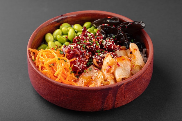 Hawaiian spicy chicken poke bowl with kimchi