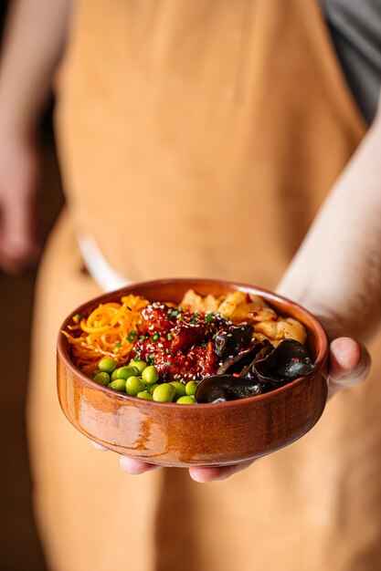 Hawaiian spicy chicken poke bowl with kimchi