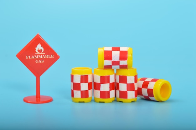 Hazardous dangerous chemical barrels with Flammable Gas sign