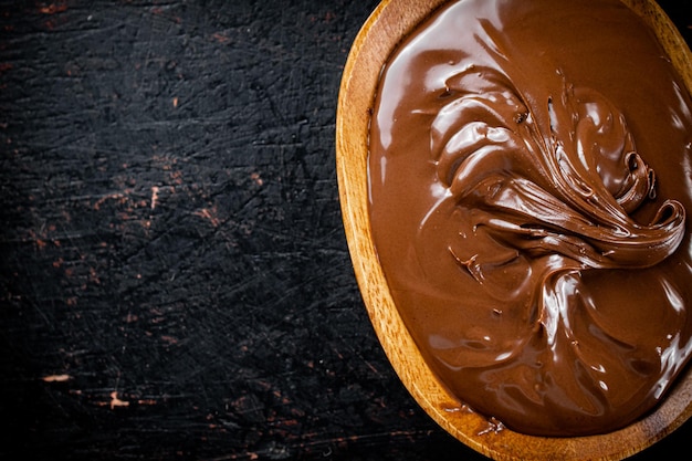 Hazelnut butter in a plate with a spoon